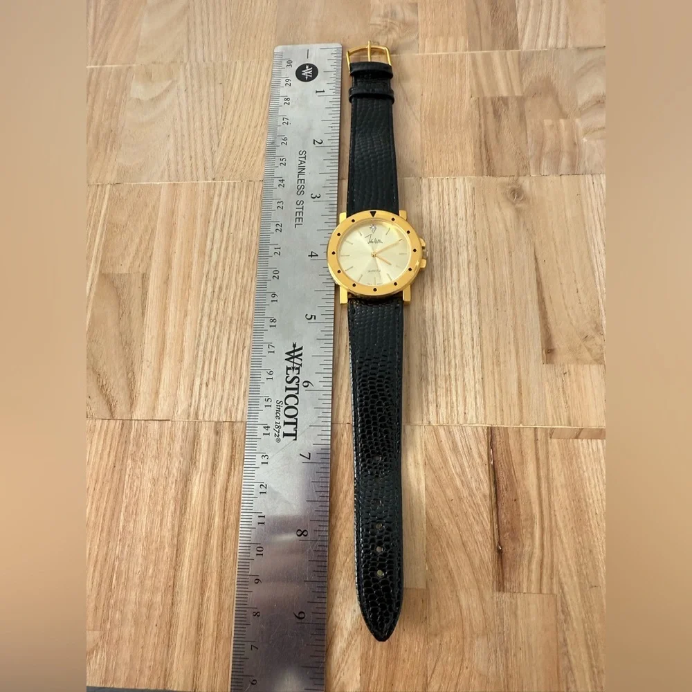 Vintage John weitz gold tone black leather watch NEW BATTERY